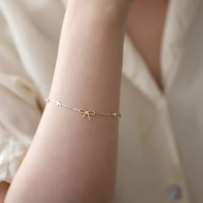 Sterling Silver Bow Bracelet – Dainty Chain with Zircon Accents