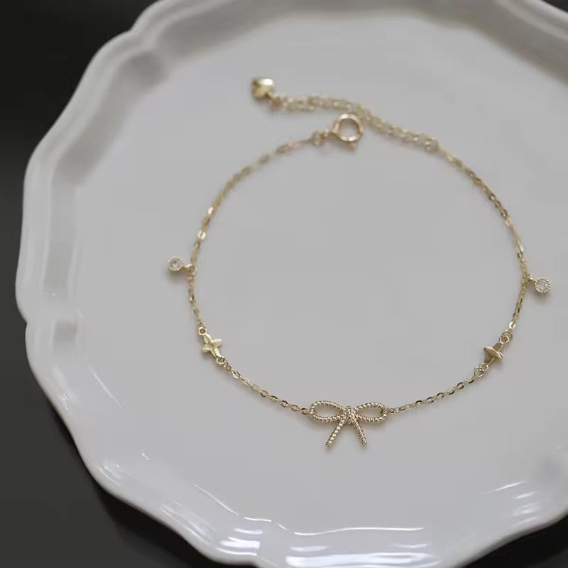 Sterling Silver Bow Bracelet – Dainty Chain with Zircon Accents