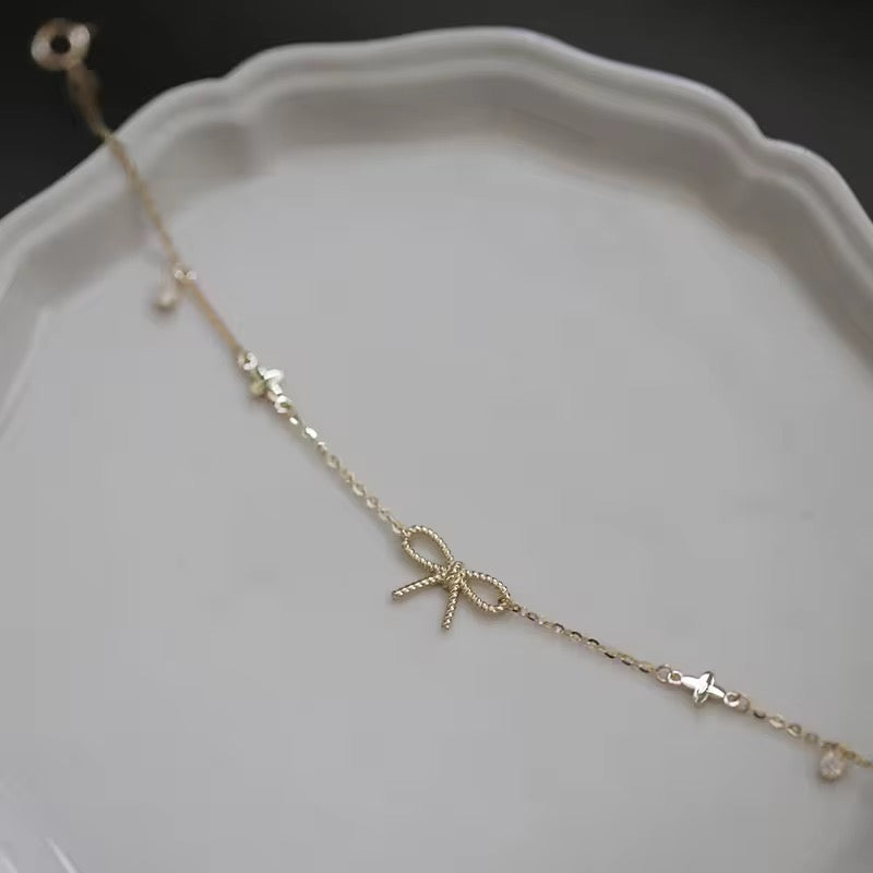 Sterling Silver Bow Bracelet – Dainty Chain with Zircon Accents