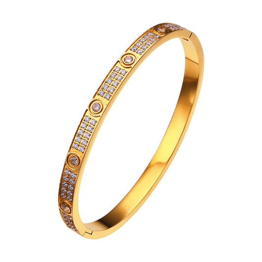 Zircon encrusted 18K Gold bangle